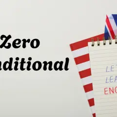 Zeszyt z napisem "Let's learn English" i flagą Wielkiej Brytanii. Temat: Zero Conditional.