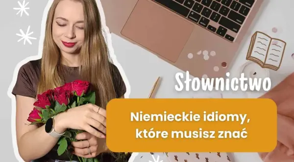 Dziewczyna z bukietem róż obok laptopa, uczy się słownictwa i niemieckich idiomów.